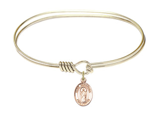 7 inch Oval Eye Hook Hamilton Gold Bangle Bracelet with a 14kt Gold Filled Saint Seraphina charm. Engraved Catholic Saint Jewelry