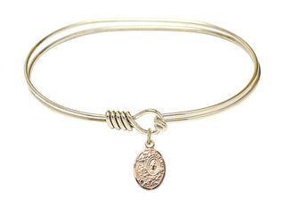 7 inch Oval Eye Hook Hamilton Gold Bangle Bracelet with a 14kt Gold Filled Miraculous charm.