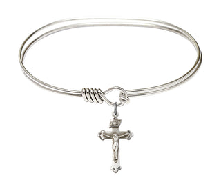 7 inch Oval Eye Hook Rhodium Bangle Bracelet with a Sterling Silver Crucifix charm.