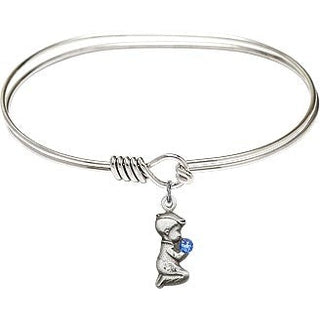 7 inch Oval Eye Hook Rhodium Bangle Bracelet with a Sterling Silver Praying Boy charm.