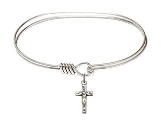 7 inch Oval Eye Hook Rhodium Bangle Bracelet with a Sterling Silver Crucifix charm.