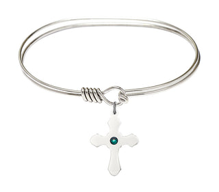 7 inch Oval Eye Hook Rhodium Bangle Bracelet with a Sterling Silver Cross charm.