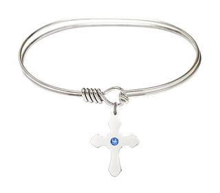7 inch Oval Eye Hook Rhodium Bangle Bracelet with a Sterling Silver Cross charm.