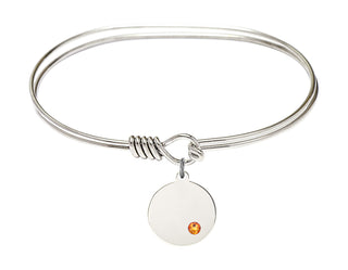 7 inch Oval Eye Hook Rhodium Bangle Bracelet with a Sterling Silver Plain Disc charm.