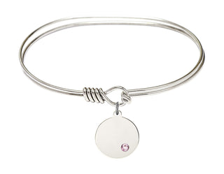 7 inch Oval Eye Hook Rhodium Bangle Bracelet with a Sterling Silver Plain Disc charm.