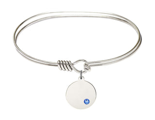 7 inch Oval Eye Hook Rhodium Bangle Bracelet with a Sterling Silver Plain Disc charm.