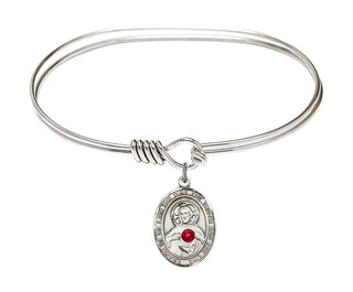 7 inch Oval Eye Hook Rhodium Bangle Bracelet with a Sterling Silver Scapular charm.