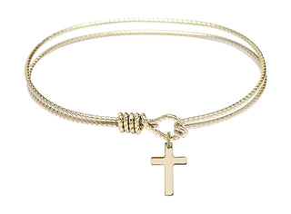 7 1/4 inch Oval Eye Hook Hamilton Gold Bangle Bracelet with a 14kt Gold Filled Cross charm.