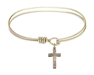 7 1/4 inch Oval Eye Hook Hamilton Gold Bangle Bracelet with a 14kt Gold Filled Crucifix charm.