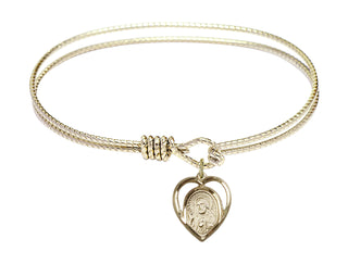 7 1/4 inch Oval Eye Hook Hamilton Gold Bangle Bracelet with a 14kt Gold Filled Scapular charm.