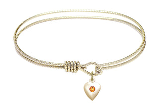 7 1/4 inch Oval Eye Hook Hamilton Gold Bangle Bracelet with a 14kt Gold Filled Heart charm.