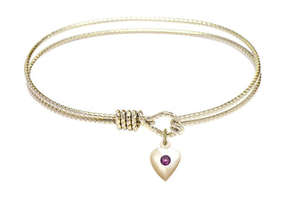 7 1/4 inch Oval Eye Hook Hamilton Gold Bangle Bracelet with a 14kt Gold Filled Heart charm.