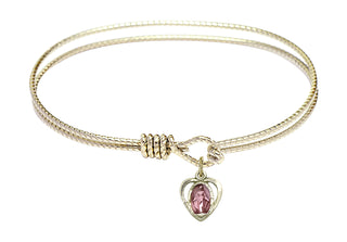 7 1/4 inch Oval Eye Hook Hamilton Gold Bangle Bracelet with a 14kt Gold Filled Miraculous charm.