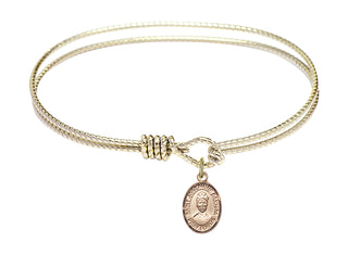 7 1/4 inch Oval Eye Hook Hamilton Gold Bangle Bracelet with a 14kt Gold Filled Saint Josephine Bakhita charm. Engraved Catholic Saint Jewelry