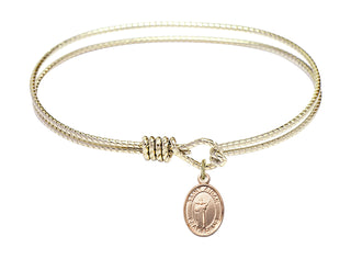 7 1/4 inch Oval Eye Hook Hamilton Gold Bangle Bracelet with a 14kt Gold Filled Saint Aidan of Lindesfarne charm. Engraved Catholic Saint Jewelry