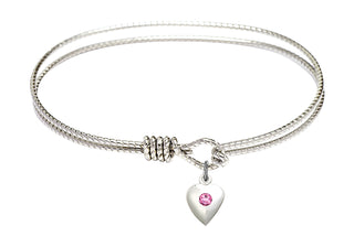 7 1/4 inch Oval Eye Hook Rhodium Bangle Bracelet with a Sterling Silver Heart charm.