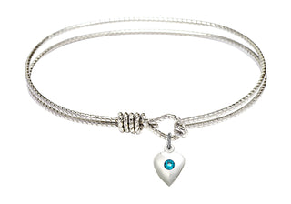 7 1/4 inch Oval Eye Hook Rhodium Bangle Bracelet with a Sterling Silver Heart charm.