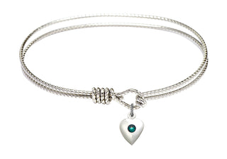 7 1/4 inch Oval Eye Hook Rhodium Bangle Bracelet with a Sterling Silver Heart charm.
