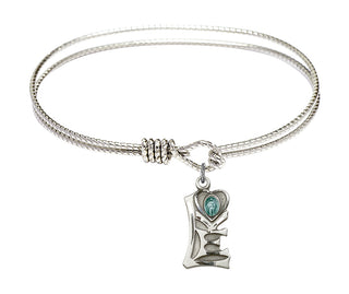 7 1/4 inch Oval Eye Hook Rhodium Bangle Bracelet with a Sterling Silver Miraculous charm.