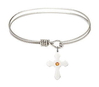 7 1/4 inch Oval Eye Hook Rhodium Bangle Bracelet with a Sterling Silver Cross charm.