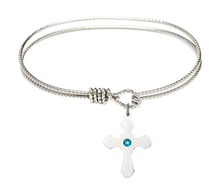 7 1/4 inch Oval Eye Hook Rhodium Bangle Bracelet with a Sterling Silver Cross charm.