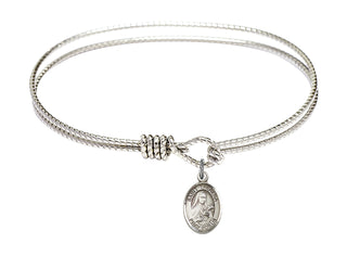 7 1/4 inch Oval Eye Hook Rhodium Bangle Bracelet with a Sterling Silver Saint Theresa charm. Engraved Catholic Saint Jewelry