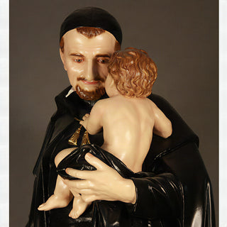 Hand-painted statue of Saint Vincent de Paul, 24 inches tall, in fiberglass resin.