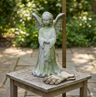 Large planter shaped like a pair of angel wings, fiberglass resin construction. — detail view