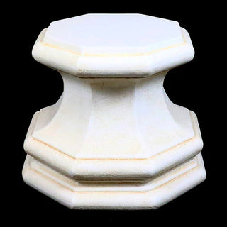 Eight-sided fiberglass resin pedestal base with flat top and angled facets. — alternate view