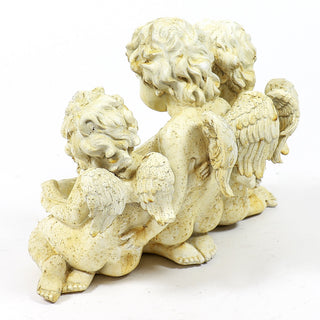 Fiberglass resin birdfeeder statue with three cherubs supporting the bowl on top — alternate view