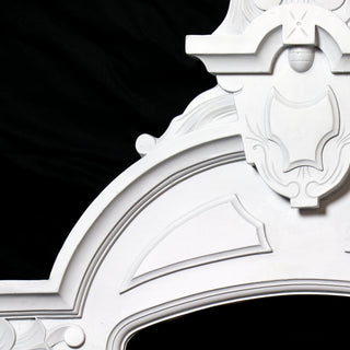 Cortland over door architectural piece in fiberglass resin with a low-relief traditional design — detail view