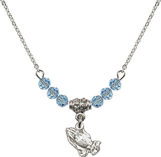 18" Rhodium Plated Necklace with 4mm Aqua Crystal Beads featuring a Sterling Silver Praying Hands Medal.