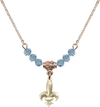 18" Hamilton Gold Plated Necklace with 4mm Aqua Crystal Beads featuring a 14kt Gold Filled Fleur de Lis Medal.