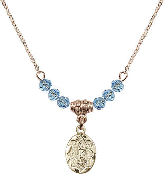 18" Hamilton Gold Plated Necklace with 4mm Aqua Crystal Beads featuring a 14kt Gold Filled Our Lady of Guadalupe Medal.