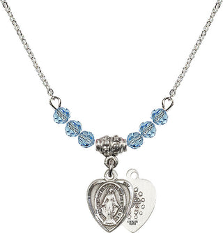 18" Rhodium Plated Necklace with 4mm Aqua Crystal Beads featuring a Sterling Silver Miraculous Medal.