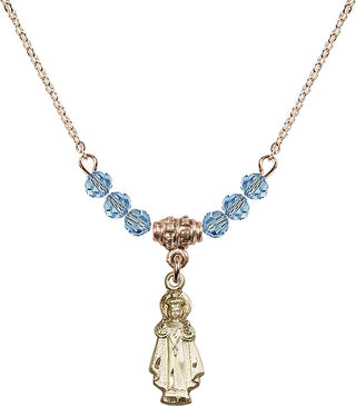 18" Hamilton Gold Plated Necklace with 4mm Aqua Crystal Beads featuring a 14kt Gold Filled Infant of Prague Medal.