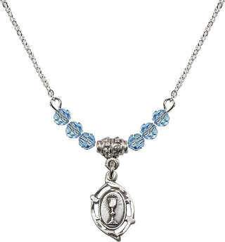 18" Rhodium Plated Necklace with 4mm Aqua Crystal Beads featuring a Sterling Silver Communion Medal.
