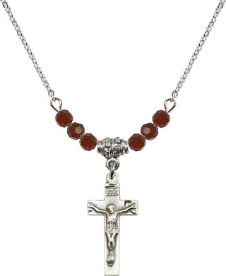 18" Rhodium Plated Necklace with 4mm Garnet Crystal Beads featuring a Sterling Silver Crucifix Medal.