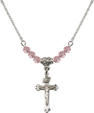 18" Rhodium Plated Necklace with 4mm Light Rose Crystal Beads featuring a Sterling Silver Crucifix Medal.
