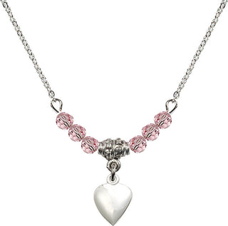 18" Rhodium Plated Necklace with 4mm Light Rose Crystal Beads featuring a Sterling Silver Heart Medal.