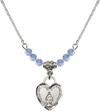 18" Rhodium Plated Necklace with 4mm Light Sapphire Crystal Beads featuring a Sterling Silver Miraculous Heart Medal. Engraved Catholic Saint Jewelry