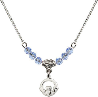 18" Rhodium Plated Necklace with 4mm Light Sapphire Crystal Beads featuring a Sterling Silver Claddagh Medal.