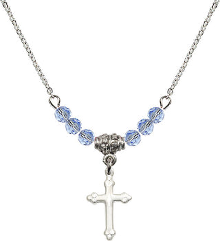 18" Rhodium Plated Necklace with 4mm Light Sapphire Crystal Beads featuring a Sterling Silver Cross Medal.