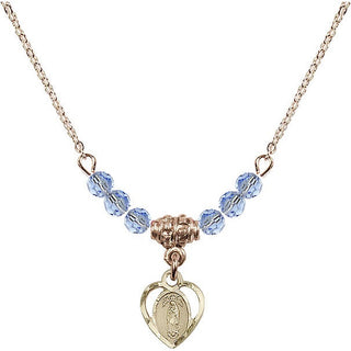 18" Hamilton Gold Plated Necklace with 4mm Light Sapphire Crystal Beads featuring a 14kt Gold Filled Our Lady of Guadalupe Medal.
