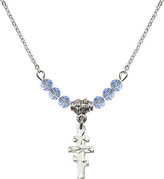 18" Rhodium Plated Necklace with 4mm Light Sapphire Crystal Beads featuring a Sterling Silver Greek Orthadox Cross Medal.