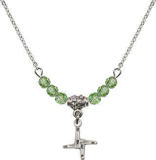 18" Rhodium Plated Necklace with 4mm Peridot Crystal Beads featuring a Sterling Silver Saint Brigid Cross Medal.