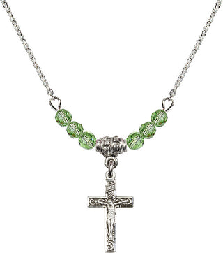 18" Rhodium Plated Necklace with 4mm Peridot Crystal Beads featuring a Sterling Silver Crucifix Medal.