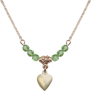 18" Hamilton Gold Plated Necklace with 4mm Peridot Crystal Beads featuring a 14kt Gold Filled Heart Medal.