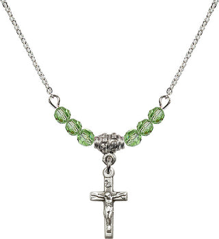 18" Rhodium Plated Necklace with 4mm Peridot Crystal Beads featuring a Sterling Silver Crucifix Medal.