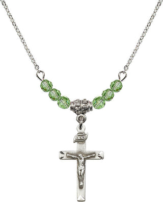 18" Rhodium Plated Necklace with 4mm Peridot Crystal Beads featuring a Sterling Silver Crucifix Medal.